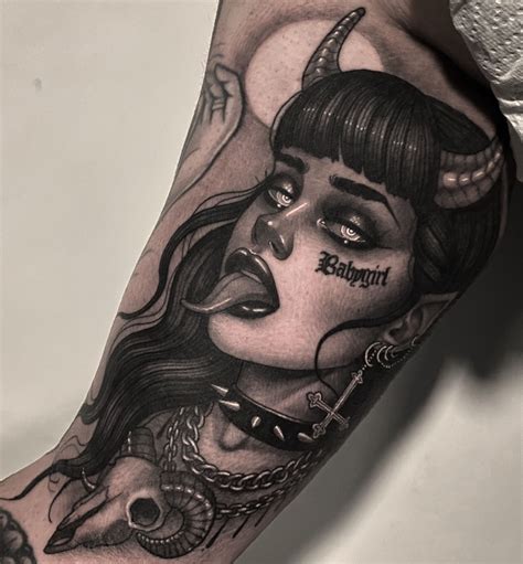 female devil tattoo